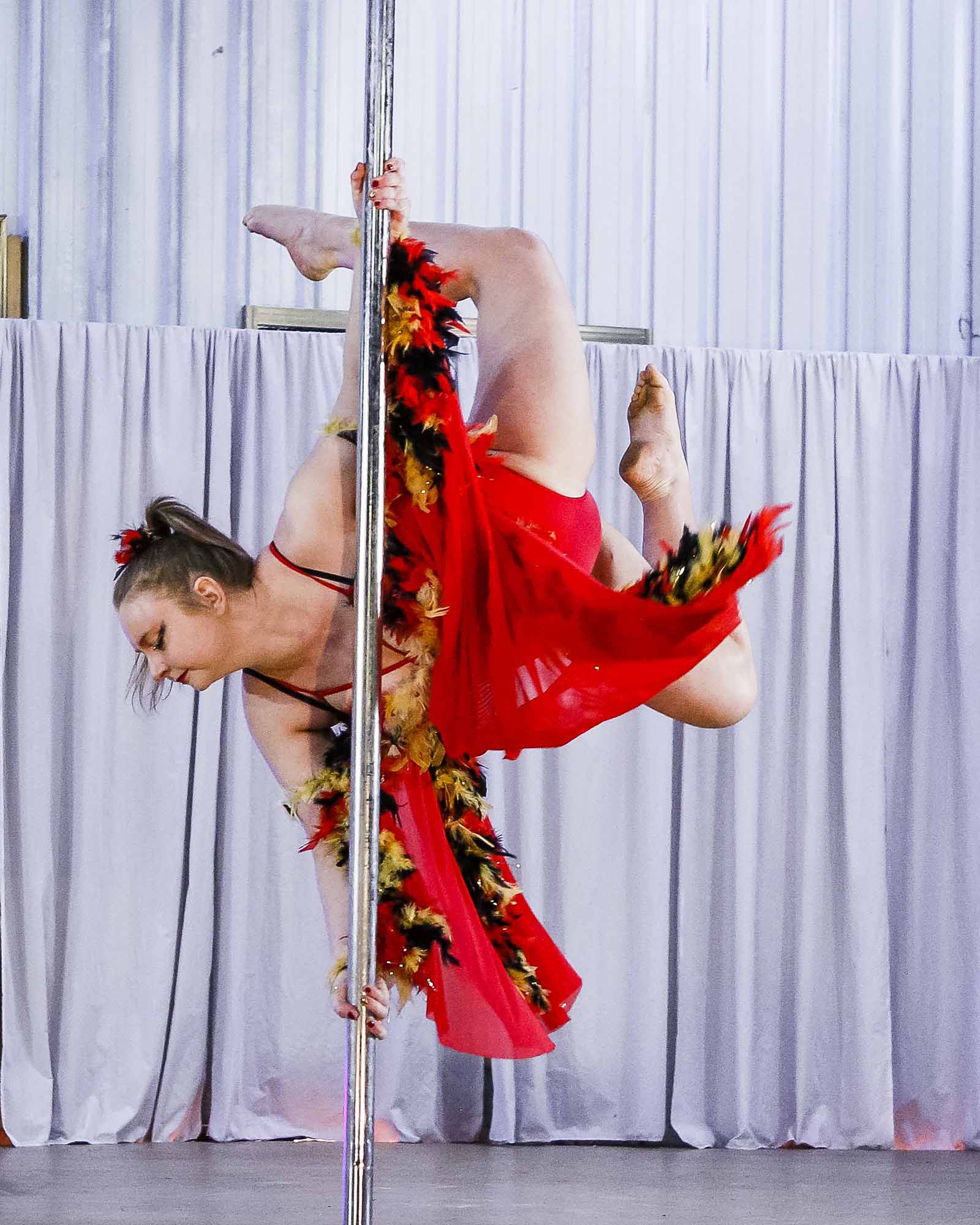 Ciara Philippa performing a pole dance routine