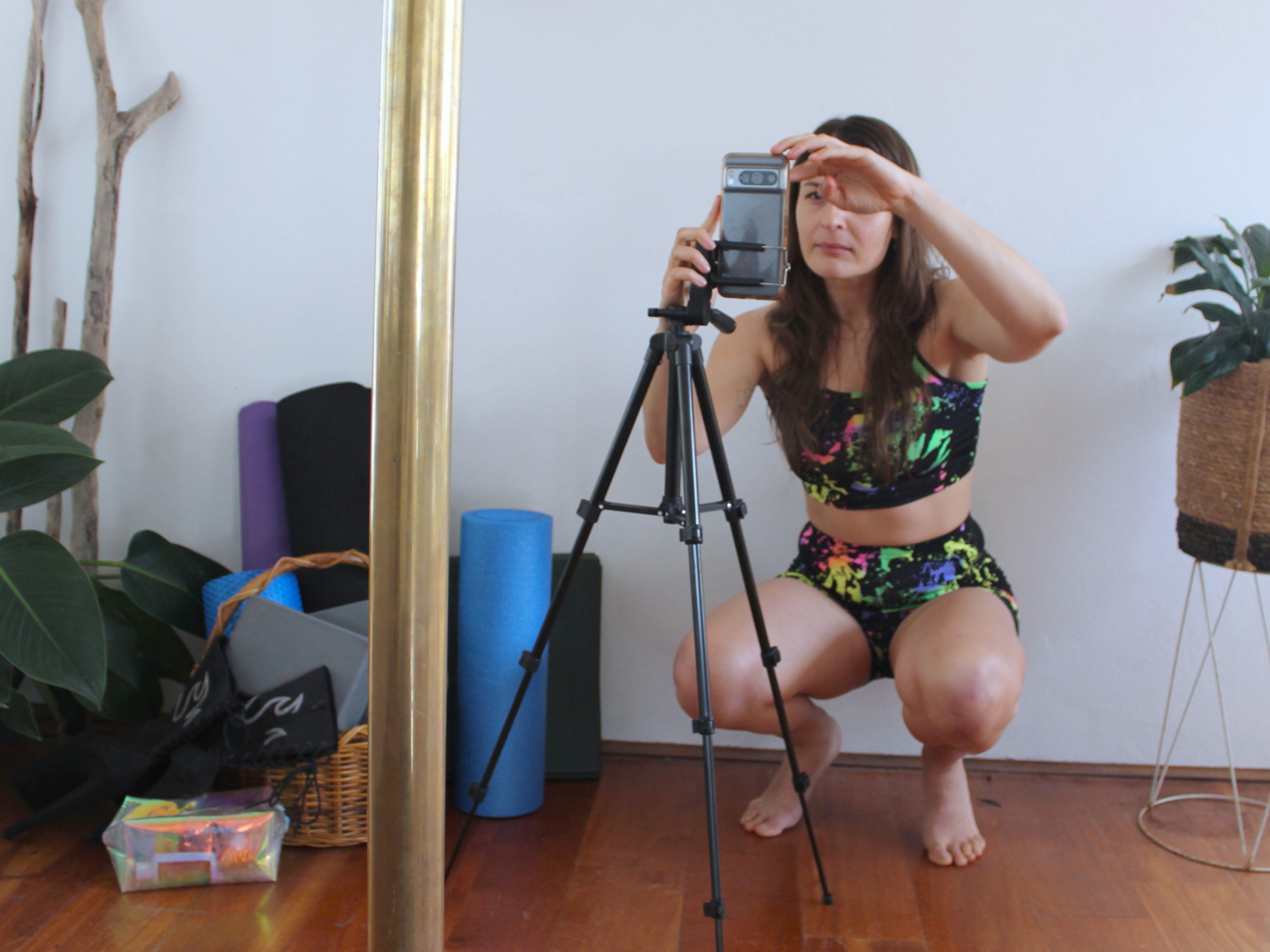 Phone on a tripod mid-class, messy mats
